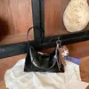 Colección de otoño 2026 transfronteriza: bolso de hombro ligero, moderno y elegante, perfecto para el trabajo y los desplazamientos, bolso de mano versátil