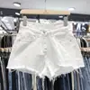 Pantalones Cortos de Mezclilla de Cintura Alta para Primavera y Verano Estudiantes Femeninas Nueva Llegada Rasgados Combinan con Todo Borde Crudo Ajustados Estilo Coreano Pantalones de Pierna Ancha Pantalones Calientes de Moda