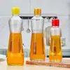 En stock botella de vinagre de salsa de soja multi-especificación roscada botella de aceite de sésamo botella de vidrio de aceite de sésamo negro botella vacía con tapa tapa de anillo de tiro