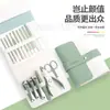 Bolsa Plegable Portátil Transfronteriza Set de 16 Piezas de Herramientas para Manicura Cuchillo para Pedicura de Piel Muerta Recogedor de Oídos Set de Herramientas de Belleza para Manicura