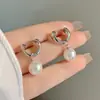 Nuevo estilo japonés y coreano dulce fresco simple metal hebilla de oreja elegante diseño de nicho pendientes de perla elegante moda joyería para orejas