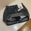 Falda corta de mezclilla talla extra para mujer, nuevo estilo de verano, falda-pantalón retro de cintura alta adelgazante línea A que se ajusta a la cadera