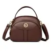 Bolsa Pequena Feminina de Couro Macio 2025 Nova Bolsa de Ombro Transversal Multicamadas Versátil para Meia-Idade Moda Bolsa Carteiro para Mãe Bolsa Concha