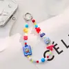 Cadena de teléfono creativa nueva de macarrón hecha a mano con cuentas, llavero de cuentas acrílicas, colgante para bolso, cordón para teléfono