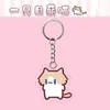 Nuevo llavero de gato emoji lindo estilo ins de salario mensual para estudiantes, colgante de mochila acrílico de dibujos animados suave y adorable