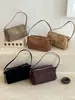 Bolso liso transfronterizo para mujer 2026 otoño nuevo elegante retro casual bolso cruzado bolso de mano de un solo hombro bolso cilíndrico