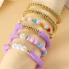 Conjunto de Pulseras de Arcilla Suave y Perlas de Estilo Bohemio Transfronterizo Nuevo Estilo Europeo y Americano Estilo Playa Pulsera Elástica de Perlas Redondas Joyería Hecha a Mano