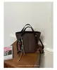 Bolsa feminina com padrão lichia 2026 nova outono alta qualidade vintage para o dia a dia bolsa de mão bolsa de ombro transversal bolsa saco