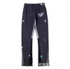 Pantalones Largos Casuales Unisex con Estampado de Letras Logo y Cordón Estilo Básico Tinta Salpicada Ropa de Pareja