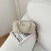 Bolso de mano de cadena con patrón de rombos retro, diseño cilíndrico, colección de otoño para mujer, chic y lujoso, versátil, y exuda una sensación de alta gama, adecuado para llevar al hombro o cruzado