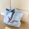 Bolsa de Lona de Gran Capacidad para Verano 2026 Bolso Tote Simple con Bordado de Letras para Mujer Bolso Tote Versátil Nuevo de Gran Capacidad