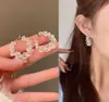 Pendientes de metal de malla hueca con círculo de cristal Pendientes de alto nivel temperamento de moda micro incrustados pendientes para mujer venta al por mayor