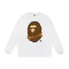 Marca moderna de estilo japonês com estampa de desenho animado de cabeça de macaco, nova blusa de moletom casual de gola redonda em terry de corte solto para homens e mulheres, adequada para adolescentes no outono e inverno