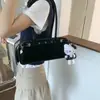 Bolso para la axila de diseño simple y nicho Nuevo bolso de mujer Verano 2025 Bolso de hombro versátil informal Bolso cruzado