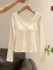 Camiseta Interior de Encaje con Lazo y Cuello en V Estilo Puro Deseo para Mujer Primavera 2026 Ajustada Camisa Base Top de Temperamento Único