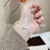 Desvanecimiento lento del colorPulsera de trébol de cuatro hojas de la suerte estilo coreano, modelo nuevo con intrincada artesanía de tallado, diseño de nicho, lujo ligero, alta gama, versátil