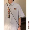 Verano Retro Americano Holgado de Moda Marca Bordado de Dibujos Animados Diseño Único Camisa de Manga Corta Tops para Hombres y Mujeres Camisas de Moda