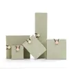 Caja de joyería de lino con hebilla de madera Wenwan caja de almacenamiento para pulsera pulsera anillo caja de brocado caja de embalaje de jade para collar colgante