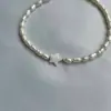 Europa y Estados Unidos transfronterizo 2024 nuevo tobillera de perlas de imitación barrocas tobillera con colgante de estrella accesorios de ropa simples de temperamento