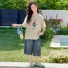 Traje de Manga Corta para Niñas 2026 Verano Nuevo Estilo Coreano Casual Camiseta para Niñas Mayores, Pantalones vaqueros de Largo Medio para Niños Conjunto de Dos Piezas t