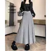 Falda de punto suave y acogedora para mujer de comercio exterior transfronterizo, falda de lana de cintura alta adelgazante para otoño e invierno, falda plisada de línea A de dobladillo ancho de longitud media