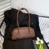 Bolso de Axila Estilo Motociclista de Diseño de Nicho para Mujer Verano 2025 Simple Gran Capacidad Personalizado Versátil Bolso de Hombro