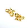 Pendientes de acero inoxidable con forma de lazo en oro de 18 quilates para mujer, estilo europeo y americano, con personalidad transfronteriza, combinables con todo, joyería de alta gama.