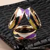 Suministro de fábrica de Amazon esmalte acero titanio hebilla de bufanda anillo gota de aceite joyería hebilla clip para nudo de bufanda una generación de cabello