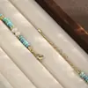 Collar de Doble Capa Nala Perla Turquesa con Colgante de Sol y Ojo del Diablo, Cadena de Clavícula Vintage en Capas para Mujer