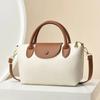 Bolso pequeño de nicho versátil para mujer 2023 nuevo bolso de hombro texturizado estilo western bolso de mensajero de alta calidad moda bolso de mano