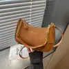 Bolsa carteiro simples e casual transfronteiriça para mulheres, bolsa de ombro da moda estilo coreano, nova bolsa transversal com corrente para o verão de 2026