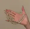 Collar de Cadena para Clavícula Estilo Palacio Retro con Flor Hueca de Pedrería, Borla de Gota de Agua, Conjunto de Accesorios de Moda de Lujo Nicho