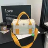 2026 Nueva Moda Bolso de Hombro Único Estilo Coreano para Mujer Alta Apariencia Bolso de Mano Tipo Almohada Casual Ligero para Viaje Bolso Cruzado