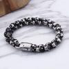 El símbolo del poder misterioso pulsera de calavera de acero de titanio retro personalidad de la moda para hombre pulsera de fantasma de acero inoxidable