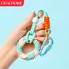 Chaveiro de anel de aperto criativo transfronteiriço para alívio de estresse, mini treinador de dedos colorido, dispositivo de aperto para alívio de estresse, pingente de mochila