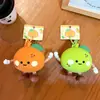 Bolsa de Monedas Naranja de Silicona Llavero Colgante Naranja Bolsa de Almacenamiento para Auriculares Colgante Llavero de Bolsa para Parejas Venta al por Mayor