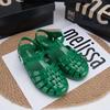 2023 Melisa infantil melissa médio e grande sandálias infantis trançadas ocas sandálias de bico fechado sapatos de praia femininos perfumados