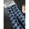 Pantalones casuales acampanados con estampado de cuadros retro para hombre, versátiles de cintura alta con bolsillos, adelgazantes y que alargan las piernas, de pierna ancha hasta el suelo