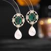 Elegantes y elegantes aretes de estilo retro de corte al por mayor, moda de lujo ligero, aretes modificadores de rostro, aretes de perlas con forma de gota de agua para mujer