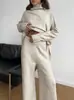 Conjunto de Suéter de Cuello Alto para Mujer Nuevo Otoño e Invierno Europeo y Americano Conjunto de Dos Piezas de Punto Casual Holgado y Pantalones Largos para Mujer