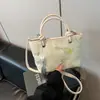 Bolsa de ombro único de mão estilo chinês novo estilo chinês transfronteiriça primavera nova chegada bordado personalizado design estiloso textura bolsa balde