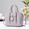 Bolso de mano de lujo para mujer, moderno y a la moda, con cierre cuadrado, nuevo bolso tipo bowling otoño e invierno, gran capacidad, de mano y cruzado, forma de concha