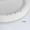 Brincos de Prata de Lei S999 com Design de Coração Vazado Versáteis de Nicho Ganchos de Orelha Assimétricos em Formato de Coração Sem Remoção e Ganchos de Orelha Anti-Queda