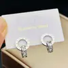 Anillo de diamantes de acero de titanio pulsera de números romanos entrelazada para mujer temperamento simple lujo ligero diseño nicho joyería que no se desvanece