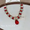 Juego de Collar y Aretes de Diamante Rojo de Alta Resistencia para Mujer, Estilo Palacio Retro, Lujo Ligero, Collar Clavicular de Cristal de Strass de Alta Gama