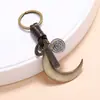 Suministro del Fabricante de Llaveros de Cuero Tejidos a Mano Estilo Vintage, Colgadores Creativos y Personalizados para Llaves de Coche con Colgante de Luna Creciente