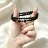 Pulsera de cuentas vintage de doble círculo en tono negro con piedra de obsidiana y ojo de tigre, una pulsera versátil de múltiples hilos para uso diario, adecuada tanto para hombres como para mujeres