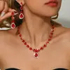 Moda Europea y Americana Verde Azul Rojo Pedrería Conjunto de Collar Pendientes Pulsera Anillo Amazon Estilo Caliente Cuatro Piezas Completamente de Diamante