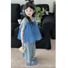 Conjunto de Verano para Niñas 2026 Nuevo Estilo Dulce Malla Transparente en Capas Camisola Camiseta y Jeans Conjunto de Tres Piezas para Bebés Niñas