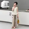 Conjunto de Verano para Niñas 2026 Nuevo Elegante Infantil Delgado Sin Mangas Hueco Top y Pantalones de Pierna Ancha Conjunto de Dos Piezas